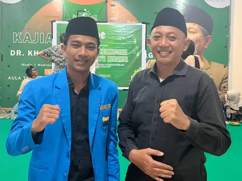 Lalu Rizki Hidayat, Ketua PC PMII Kota Mataram bersama Ipda Andri, Perwakilan Polrestas Mataram