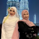 Elvin Eka Wanidia Utami (Baju Hitam) bersama kliennnya (baju putih) di Malaysia