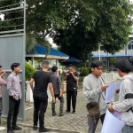 Aliansi Kajian Advokasi Mahasiswa Sumatra Utara (AKAMSU) saat menggelar aksi