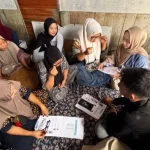 Kegiatan sosialisasi, serap aspirasi, dan pembagian kacamata baca bagi masyarakat Panarung Bawah