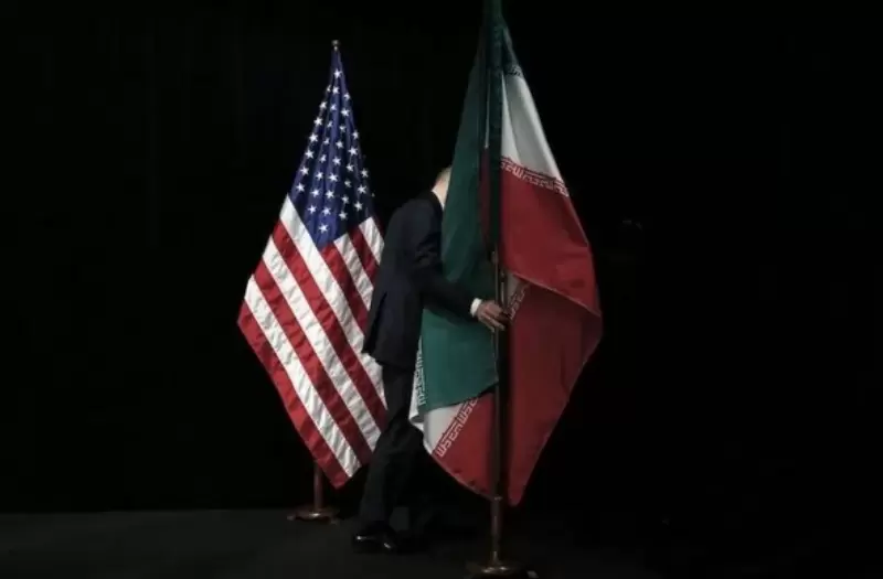 Bendera AS dan Iran (dok. CARLOS BARRIA/POOL/AFP via Getty Images)